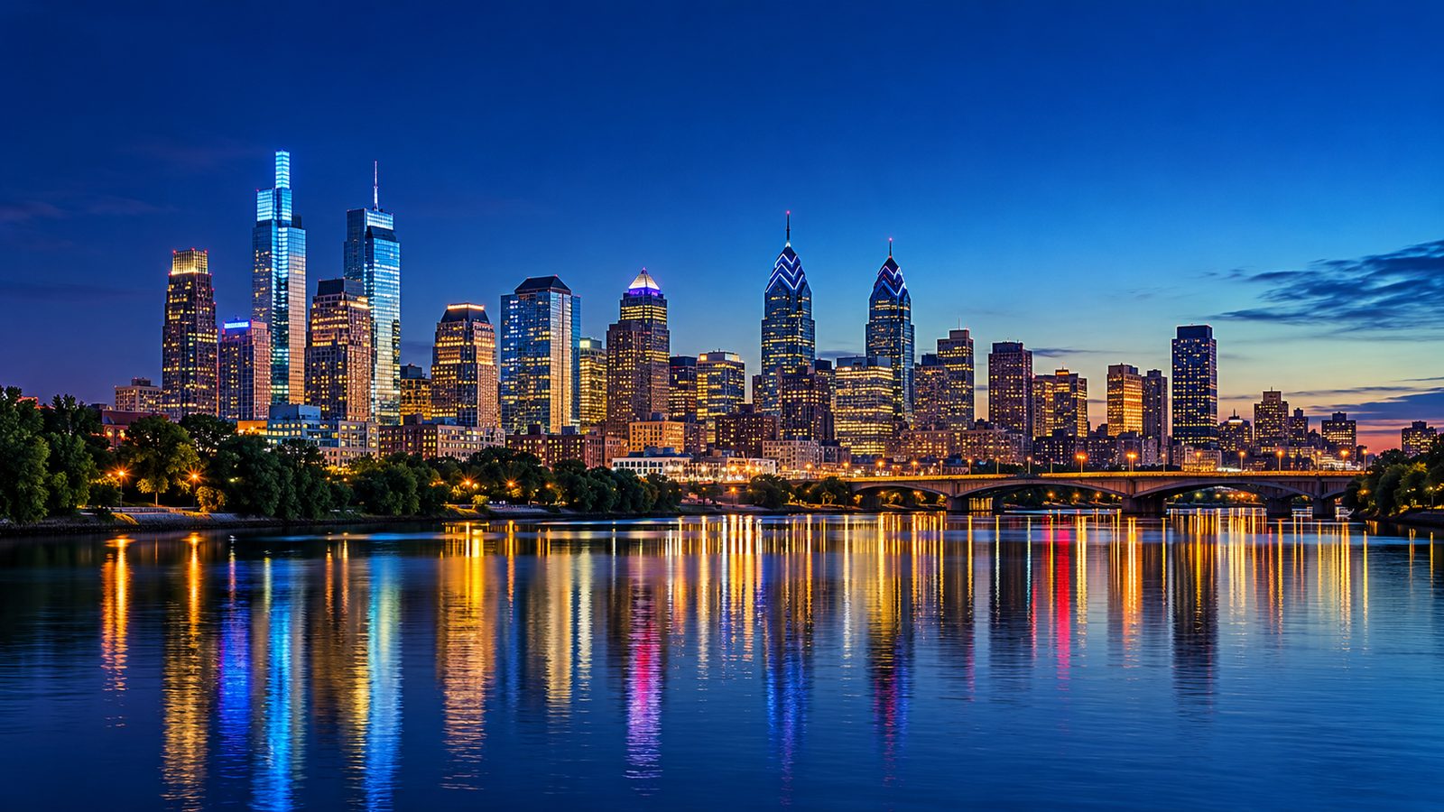 The Philadelphia skyline at dusk, reflected in the Schuylkill River